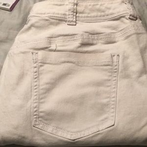 Lane Bryant White Denim 5 pocket jeans.